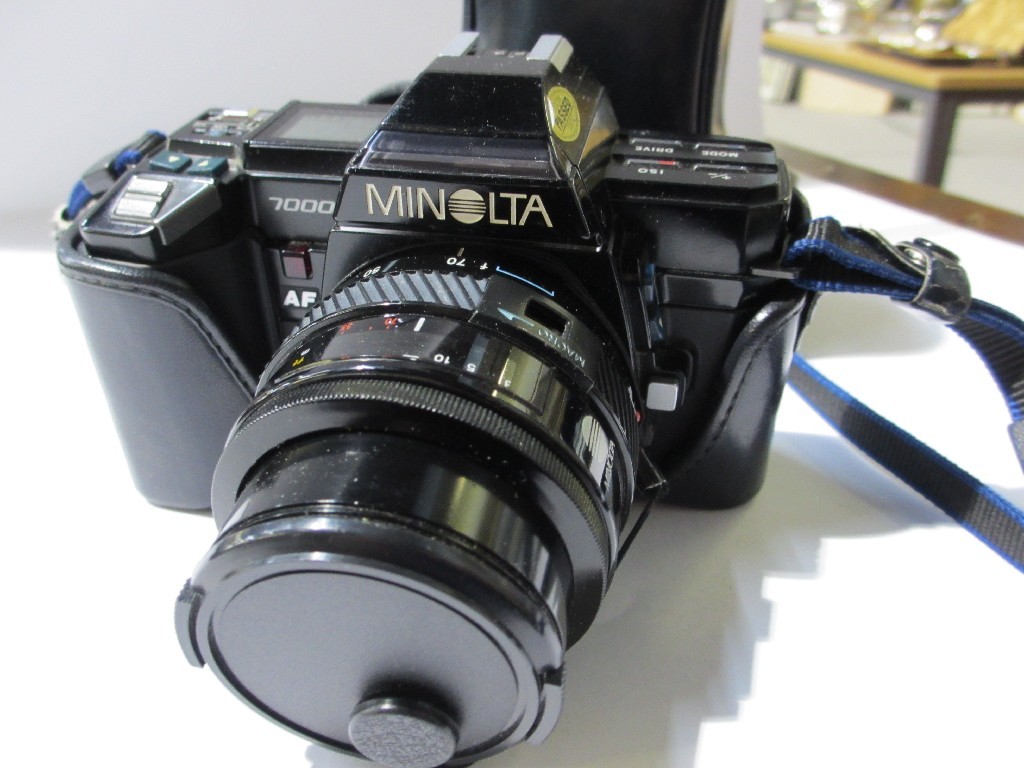 Appraisal: Minolta camera with accessories in bag