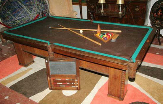 Appraisal: VINTAGE BRUNSWICK WALNUT POOL TABLE early th century as-is condition