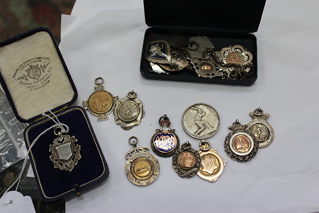 Appraisal: A GROUP OF SILVER SPORTING MEDALS