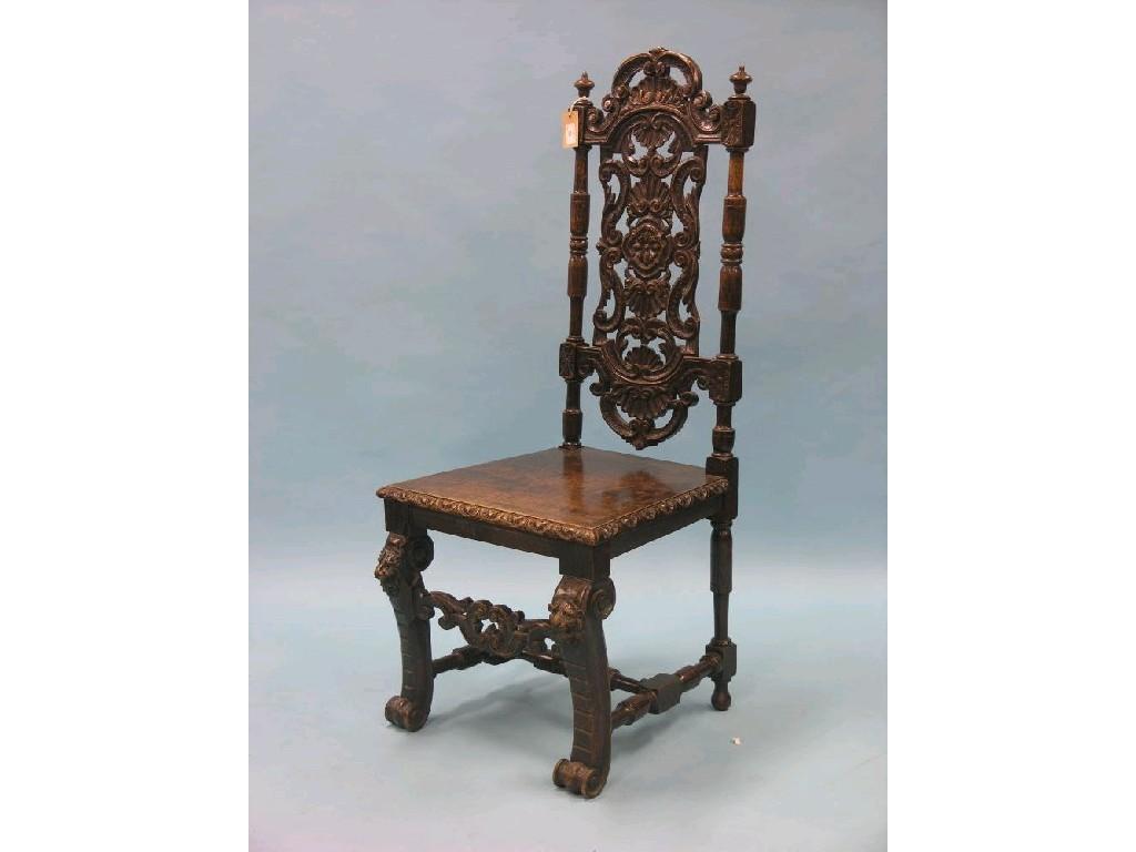 Appraisal: A th century dark oak hall chair with boldly-carved splat