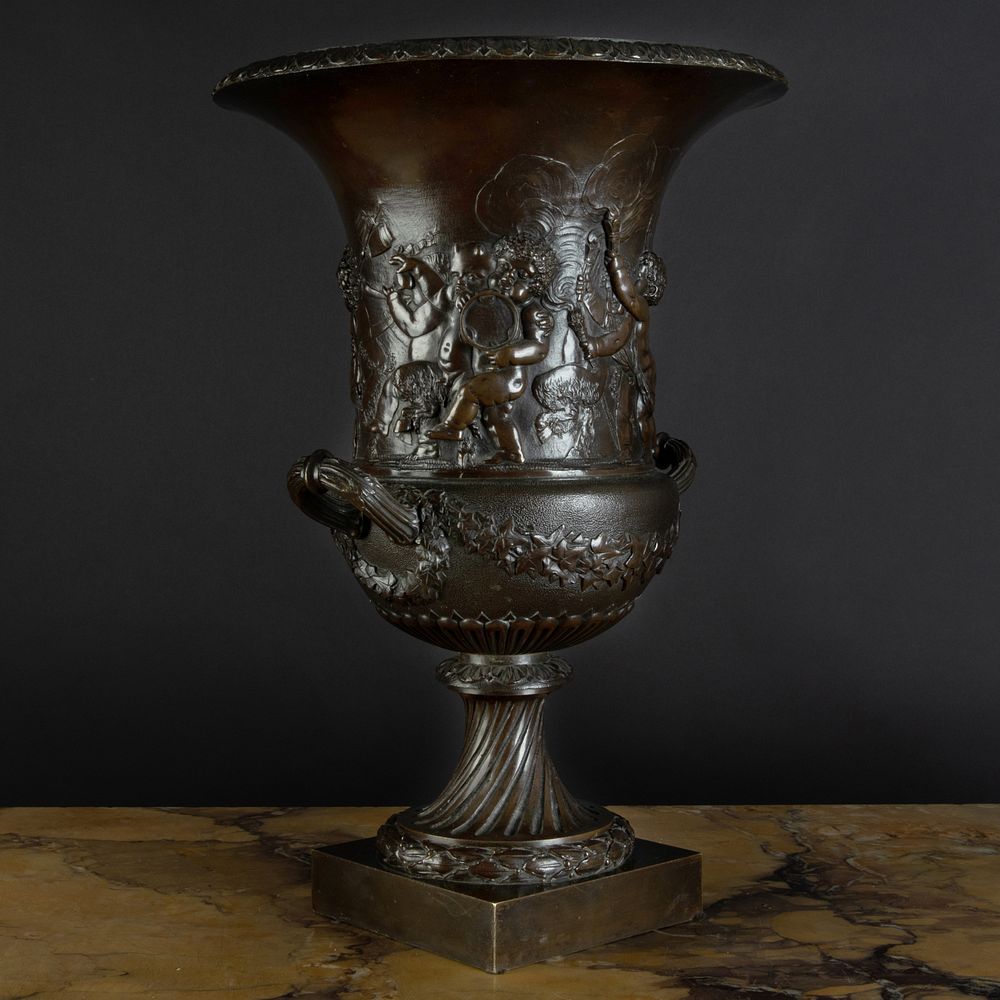 Appraisal: European Bronze Campana-Formed Urn Cast with a high relief frieze