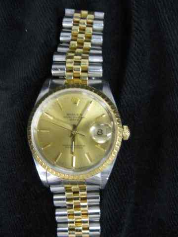 Appraisal: Man's Rolex Wristwatch stainless K goldchampagne dial and jubilee band