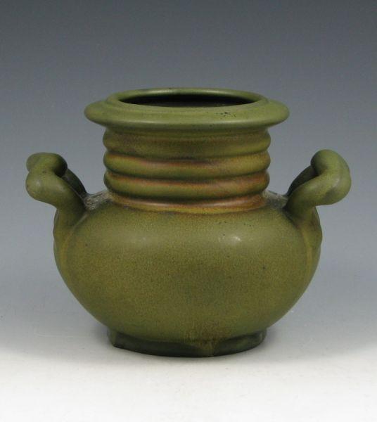 Appraisal: Weller handled vase in rich matte green glaze Marked Weller