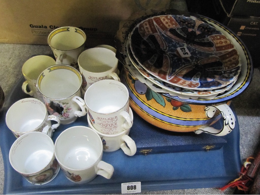 Appraisal: Tray lot to include commemorative cups Imari plates chamber pot