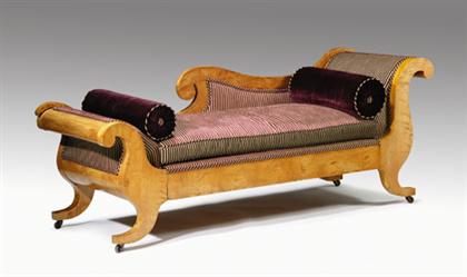 Appraisal: Biedermeier fruitwood chaise With scrolled back and sides on out-swept