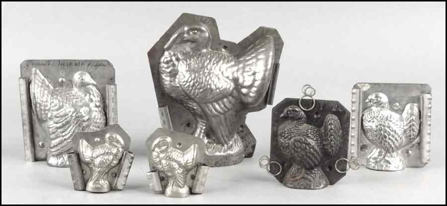 Appraisal: GROUP OF SIX TIN TURKEY MOLDS Condition No Specific Condition