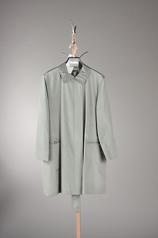 Appraisal: Akris steel green knee-length coat fully lined belt front placket