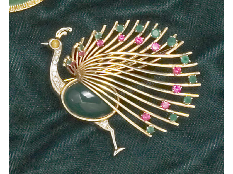 Appraisal: PEACOCK BROOCH k yellow and white gold brooch set with