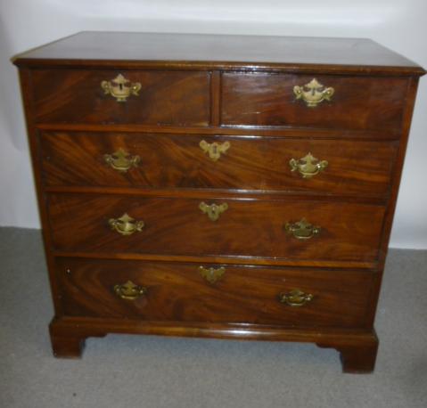 Appraisal: A GEORGE III MAHOGANY CHEST c the moulded edged top