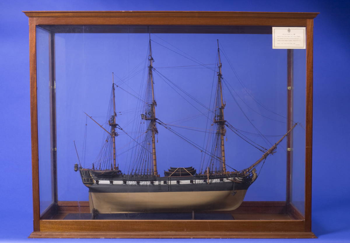 Appraisal: CASED MODEL OF A SWEDISH FRIGATE The carved wood hull