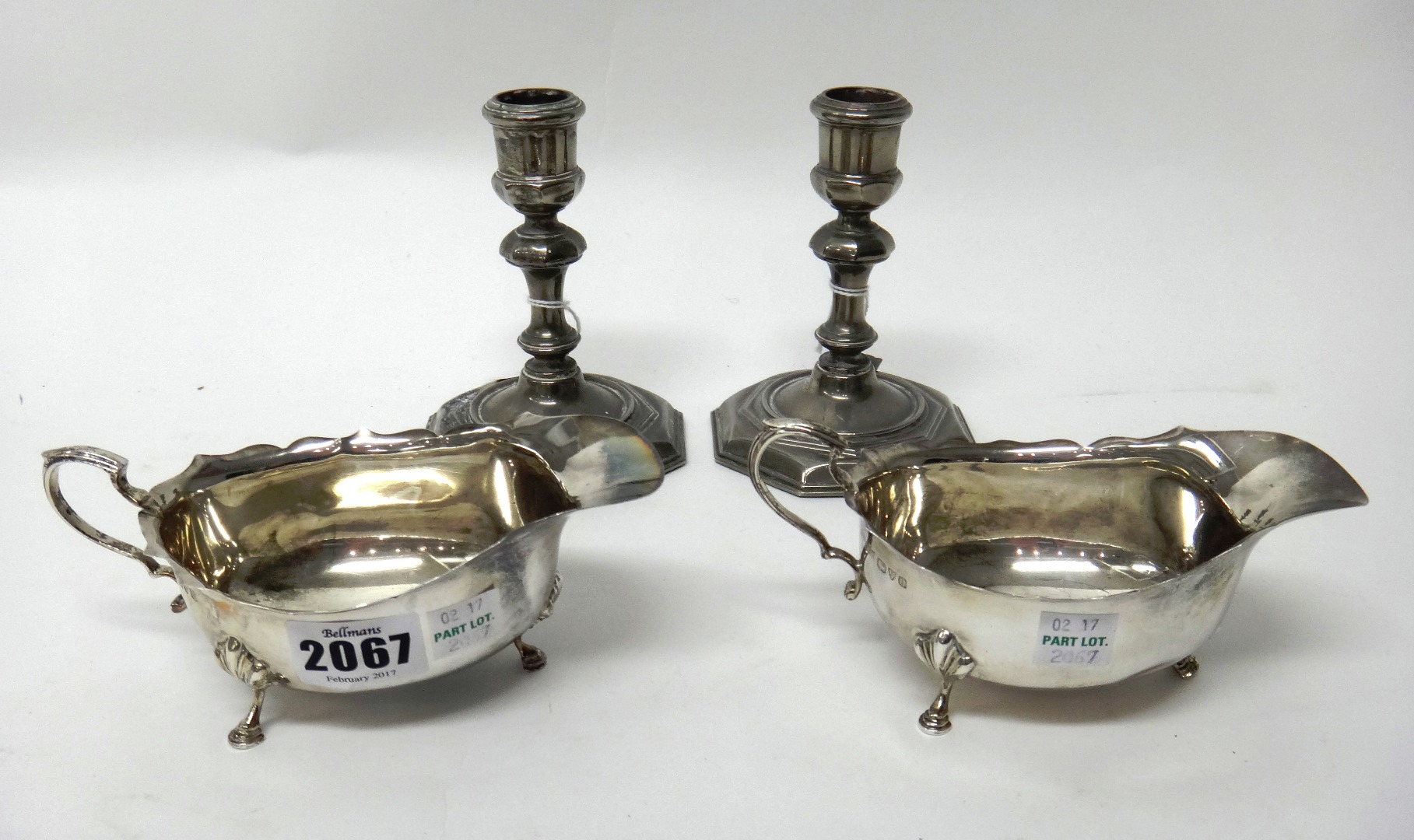 Appraisal: A pair of silver sauceboats each with a wavy rim