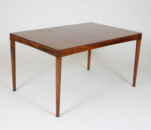 Appraisal: Bramin Danish Modern rosewood dining table shaped corners self -storing