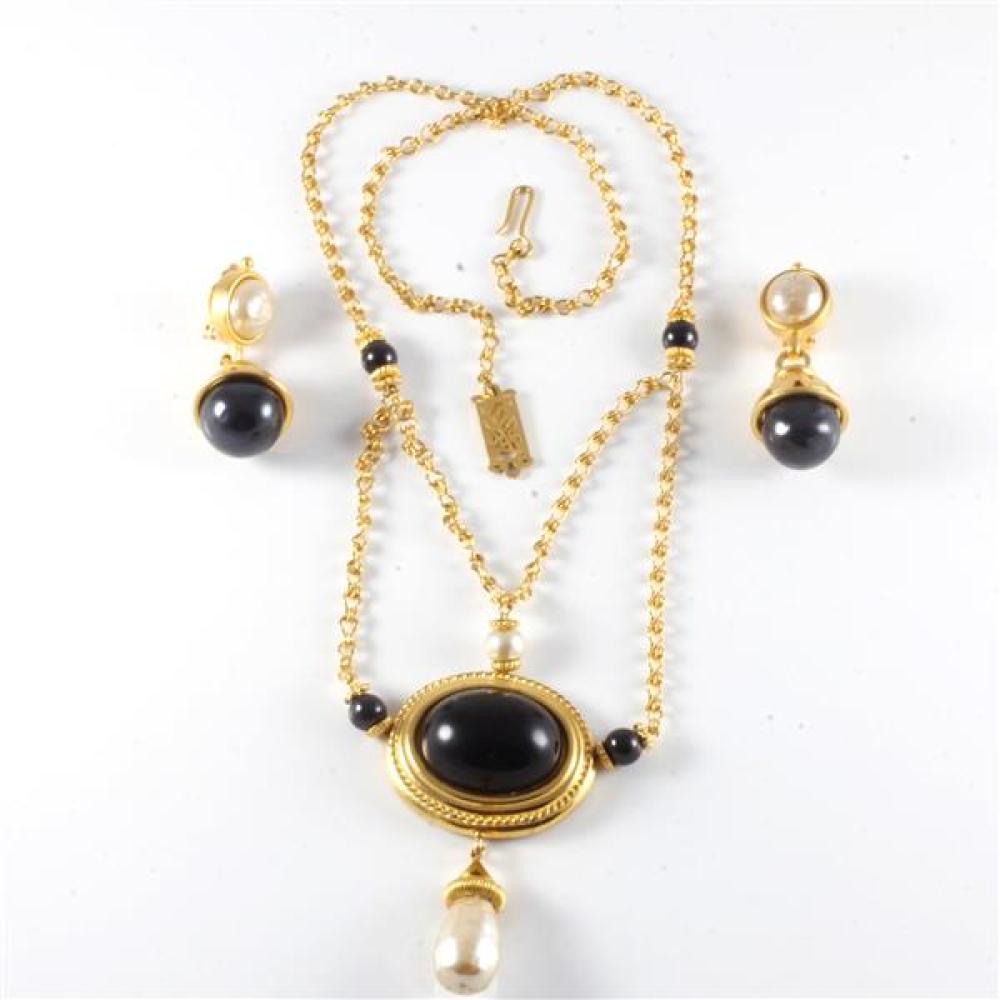 Appraisal: KARL LAGERFELD GOLD TONE MEDALLION NECKLACE WITH LARGE BLACK RESIN