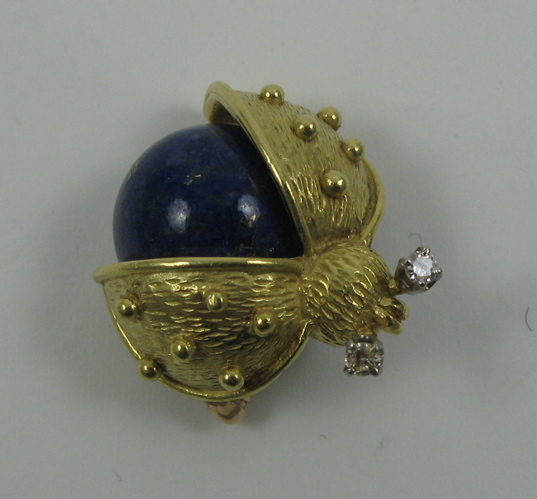 Appraisal: LAPIS LAZULI DIAMOND AND TEN KARAT GOLD BROOCH set with