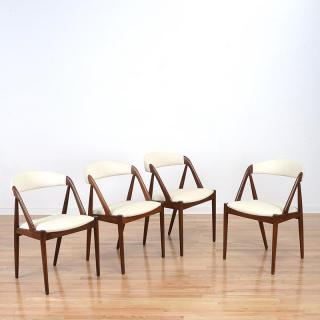 Appraisal: Set Kai Kristiansen teak dining chairs Set Kai Kristiansen teak