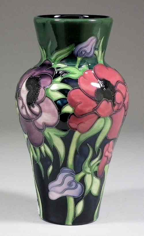 Appraisal: A modern Moorcroft pottery baluster shaped vase decorated with anemones