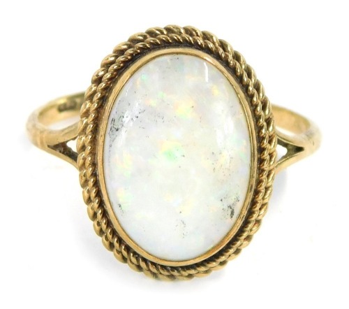 Appraisal: A ct gold opal dress ring the oval opal in