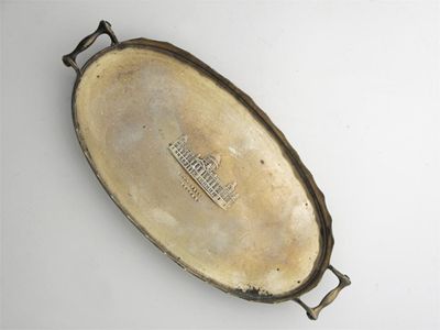 Appraisal: An Edwardian miniature two-handled oval tray with a wavy rim