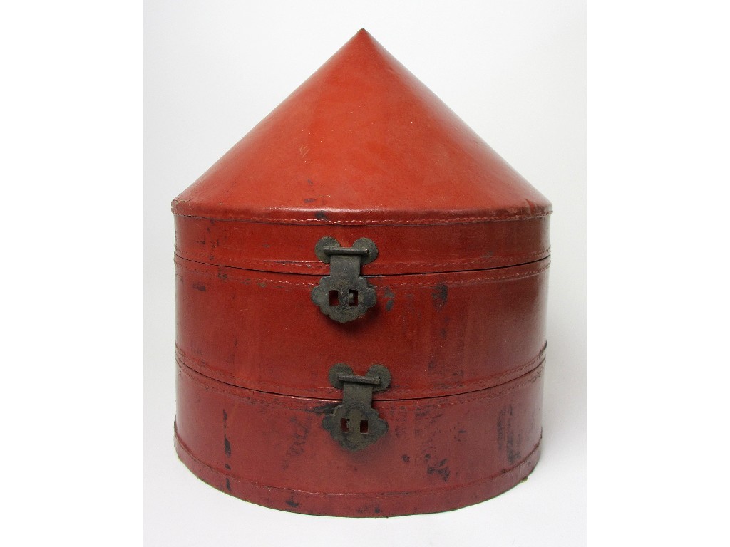 Appraisal: A two tier red leather mandarin hat box with two