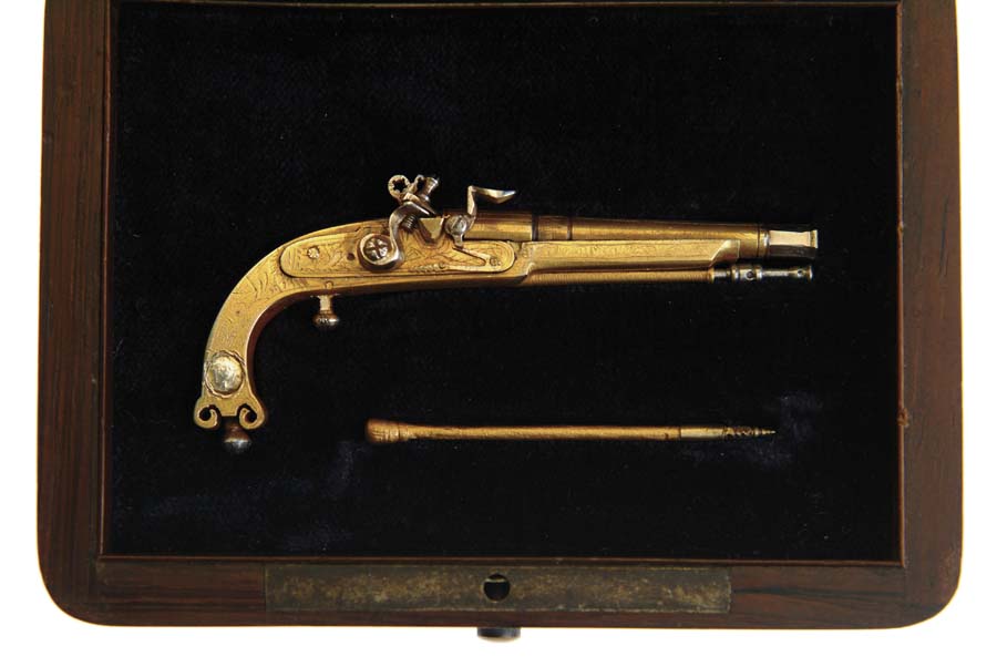 Appraisal: MINIATURE SCOTTISH ALL METAL FLINTLOCK PISTOL Beautifully detailed gold plated