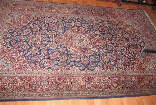 Appraisal: KESHAN old Blue ground with a red central medallion and