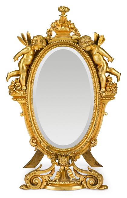 Appraisal: Louis XVI style gilt Bronze table mirrorlate th century