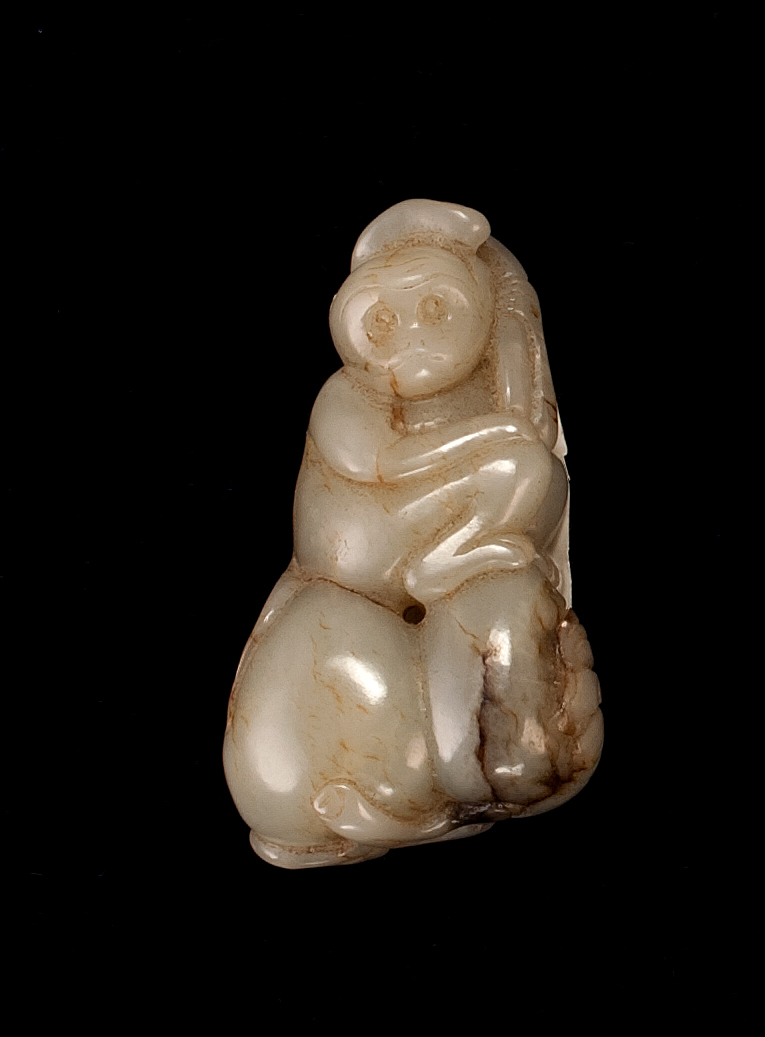 Appraisal: CELADON JADE PENDANT Circa In the form of a monkey