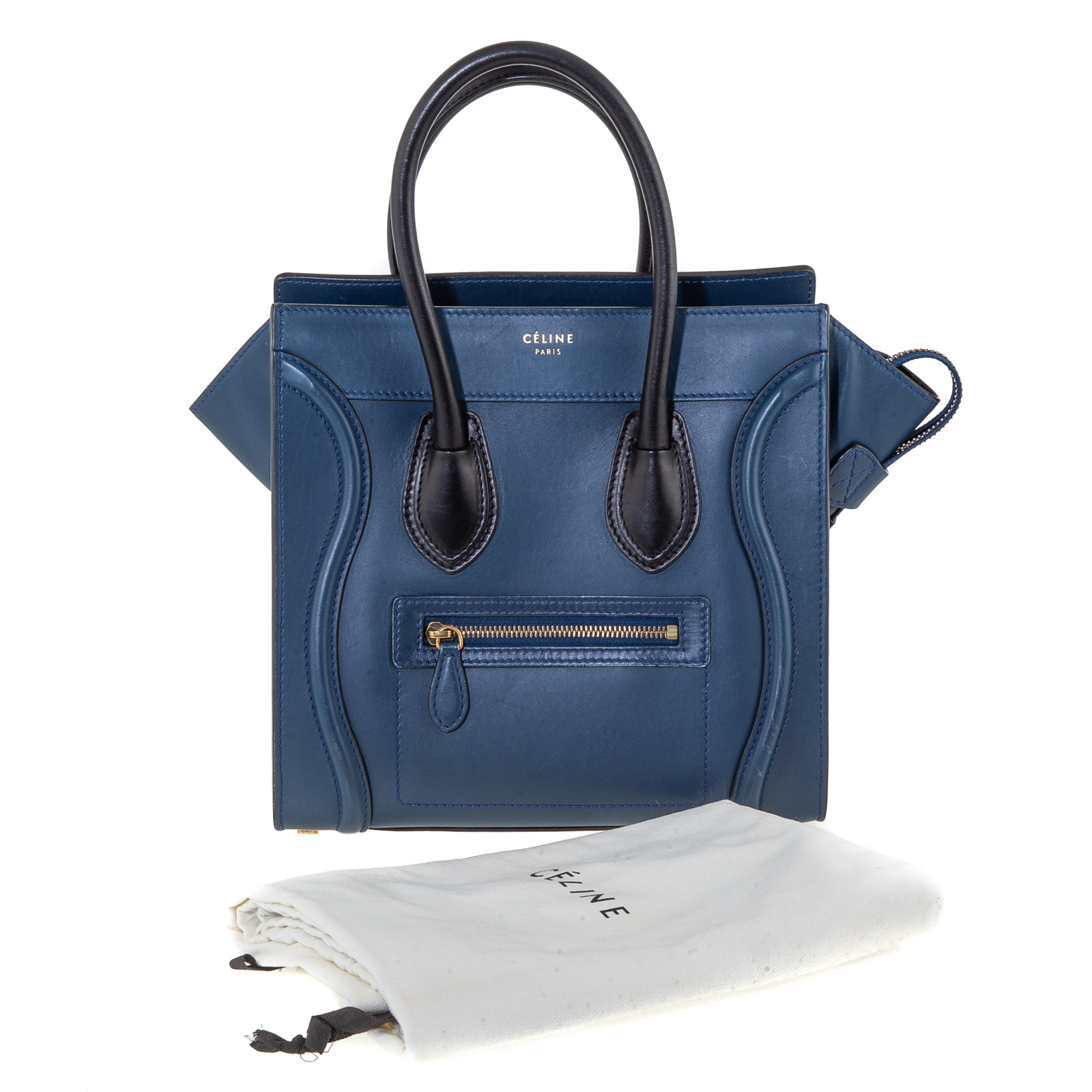 Appraisal: A CELINE MICRO LUGGAGE HANDBAG A navy and black leather