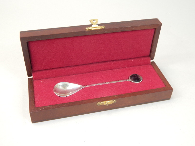 Appraisal: A modern silver spoon the handle inset with a Blue