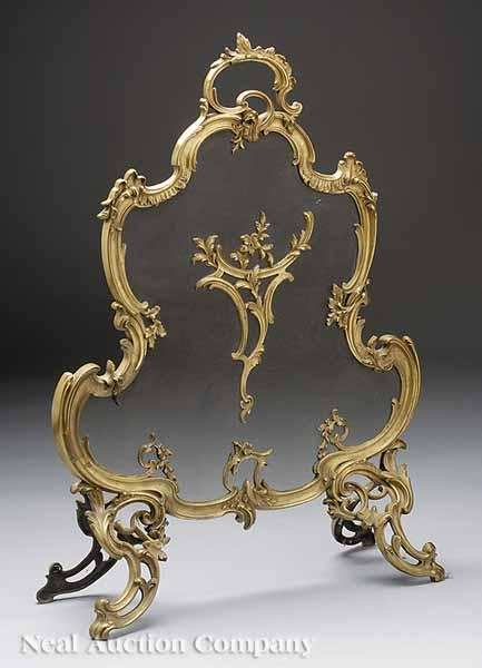 Appraisal: A Vintage Continental Rococo-Style Gilt Metal Firescreen the profile of