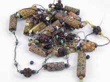 Appraisal: A quantity of millefiori glass beads in need of re-stringing