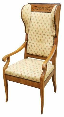 Appraisal: Biedermeier style wingback armchair mid th c fruitwood frame with