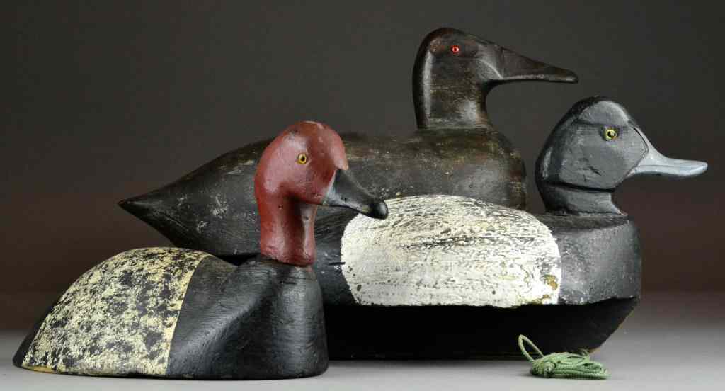 Appraisal: American Carved Painted Duck DecoysAll retaining an old if not