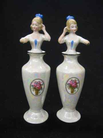 Appraisal: Pair of German Art Deco Porcelain Perfumebottles figural half doll