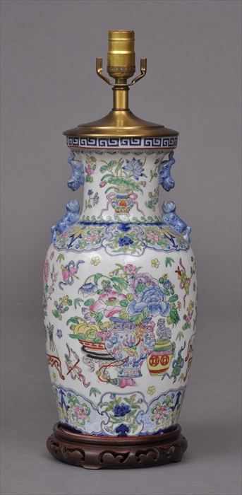 Appraisal: CHINESE EXPORT-STYLE PORCELAIN VASE MOUNTED AS A LAMP The baluster-shaped