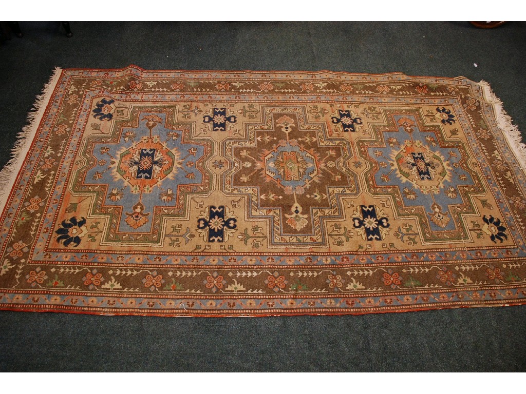 Appraisal: PROBABLY SAMARKAND TRIBAL RUG with three large pale blue orange