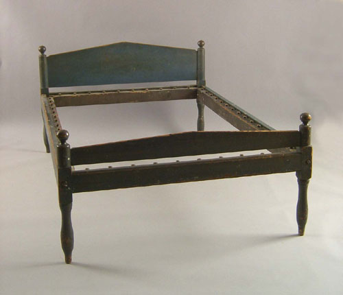 Appraisal: Pennsylvania painted rope bed ca retaining its original blue surface