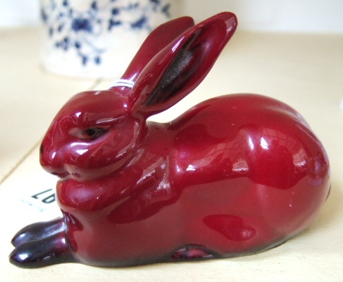 Appraisal: A Royal Doulton Flambe ware figure of a seated rabbit