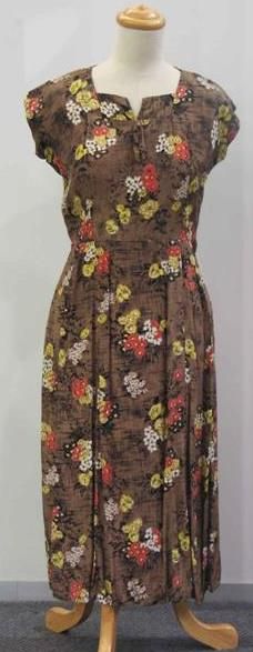 Appraisal: Two piece ensemble in floral printed brown rayon comprising dress