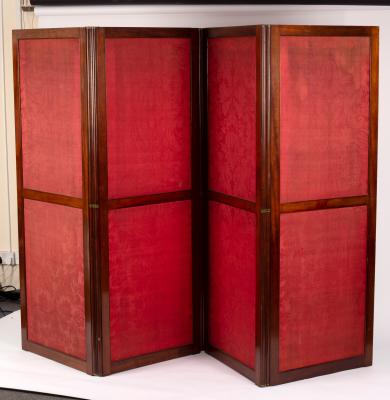 Appraisal: A mahogany framed four-panel folding screen set with damask panels