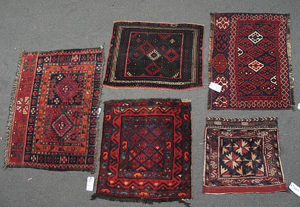 Appraisal: A Baluch chuval together with four other Kurdish weavings size