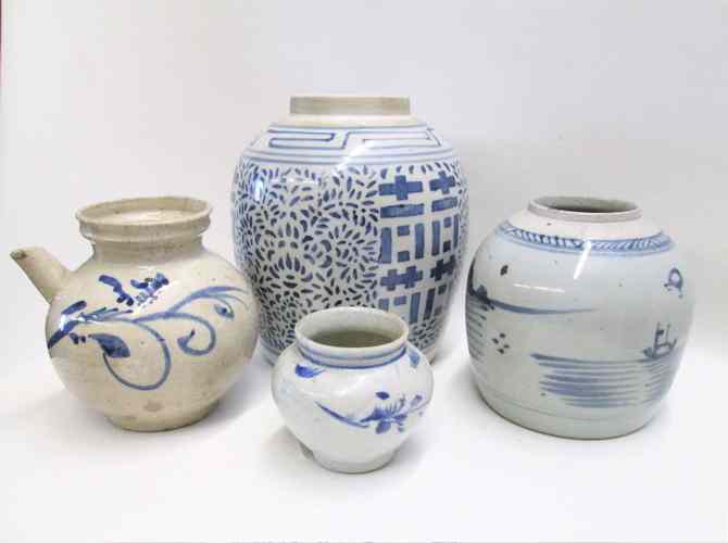 Appraisal: FOUR ASIAN BLUE AND WHITE PORCELAINS jars one oil jar