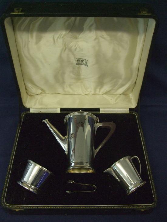 Appraisal: George VI silver four piece coffee service comprising coffee pot