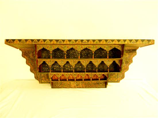 Appraisal: Moroccan Nepal type wall shelf polychrome painted finish '' h