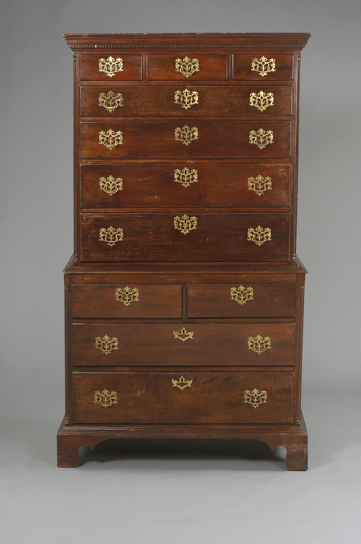 Appraisal: PENNSYLVANIA CHIPPENDALE WALNUT CHEST ON CHEST The rectangular dentil-molded cornice