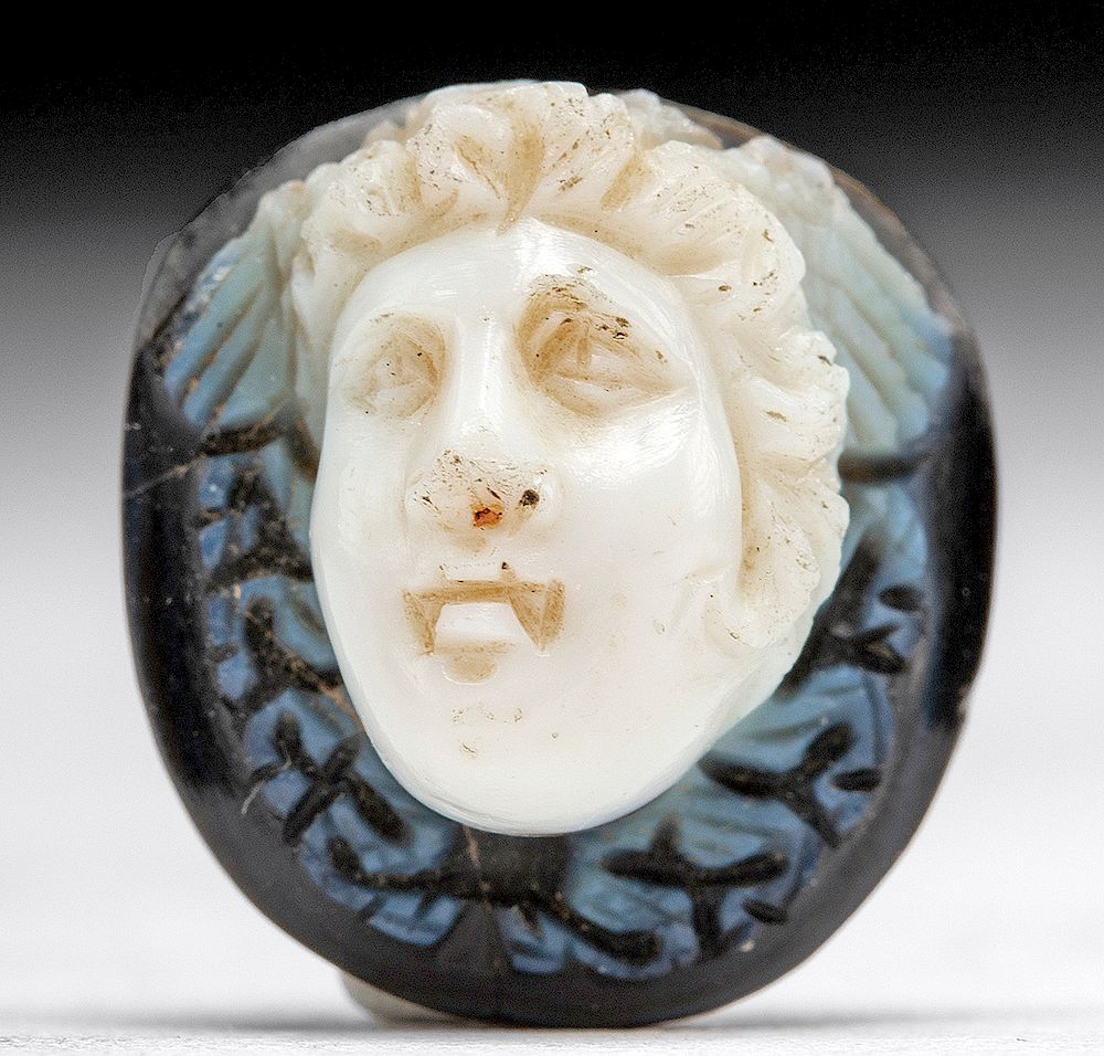 Appraisal: Roman Sardonyx Cameo of a Winged Erote Face Roman Imperial