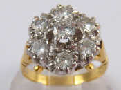 Appraisal: A yellow metal tests carat gold diamond cluster ring total