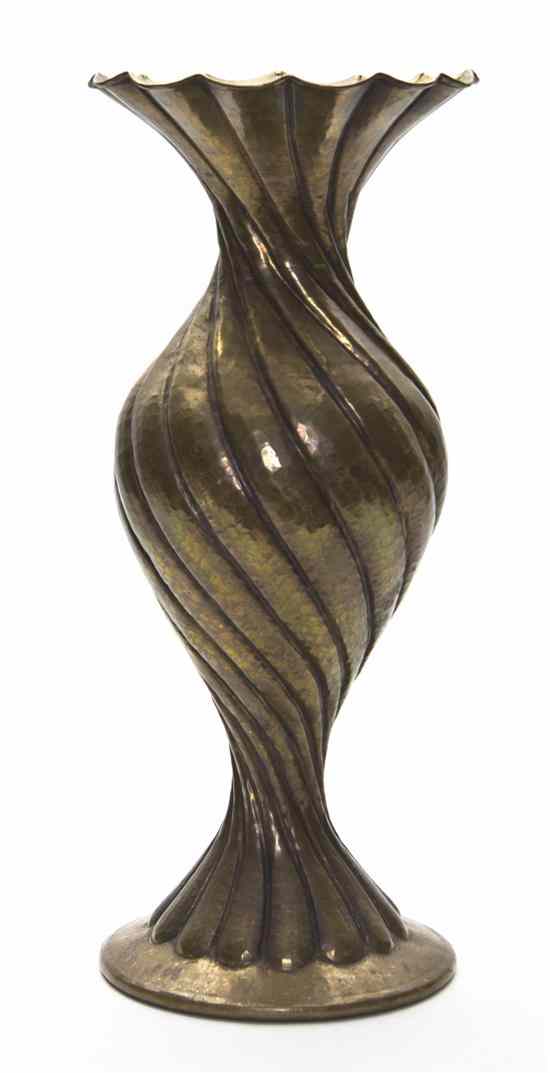 Appraisal: An Italian Brass Vase of baluster form the twisted ribbed