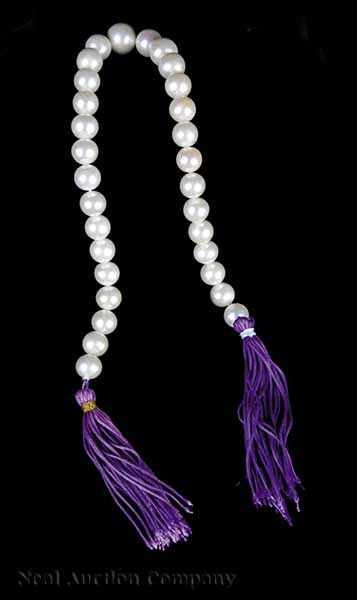 Appraisal: A Strand of Thirty White Cultured Pearls graduated from to