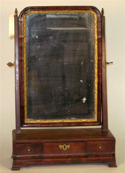 Appraisal: Mahogany and giltwood dressing mirror Rectangular shaped mirror plate on